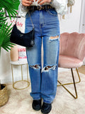 Jeans con strappi wide leg