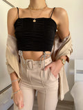 Top drappeggiato con fiocchetti