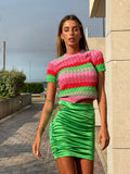 Gonna aderente verde con punto luce