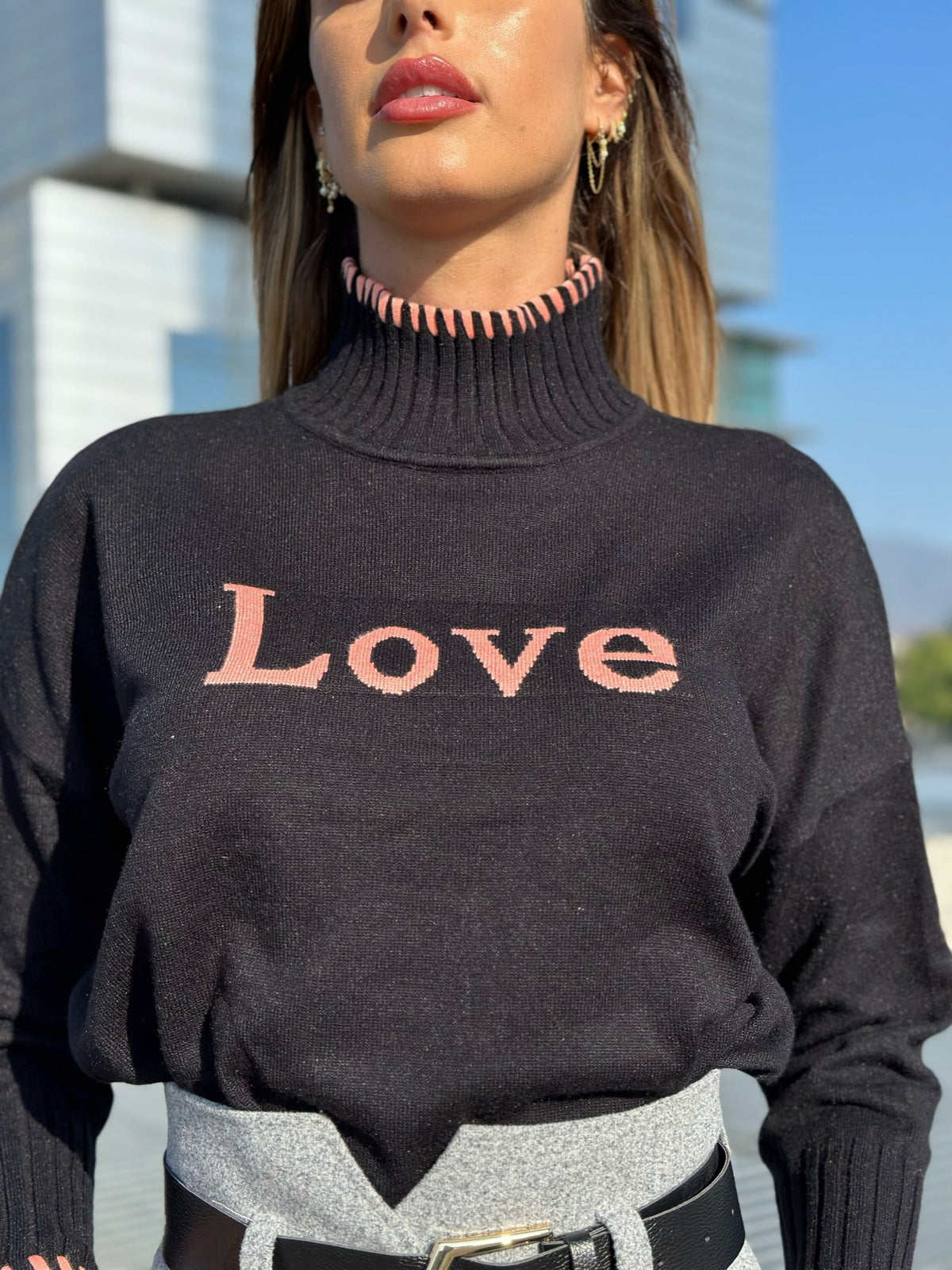 Pull nero e rosa