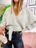 Maglione incrociato con ricami