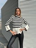 Maglione a righe collo alto