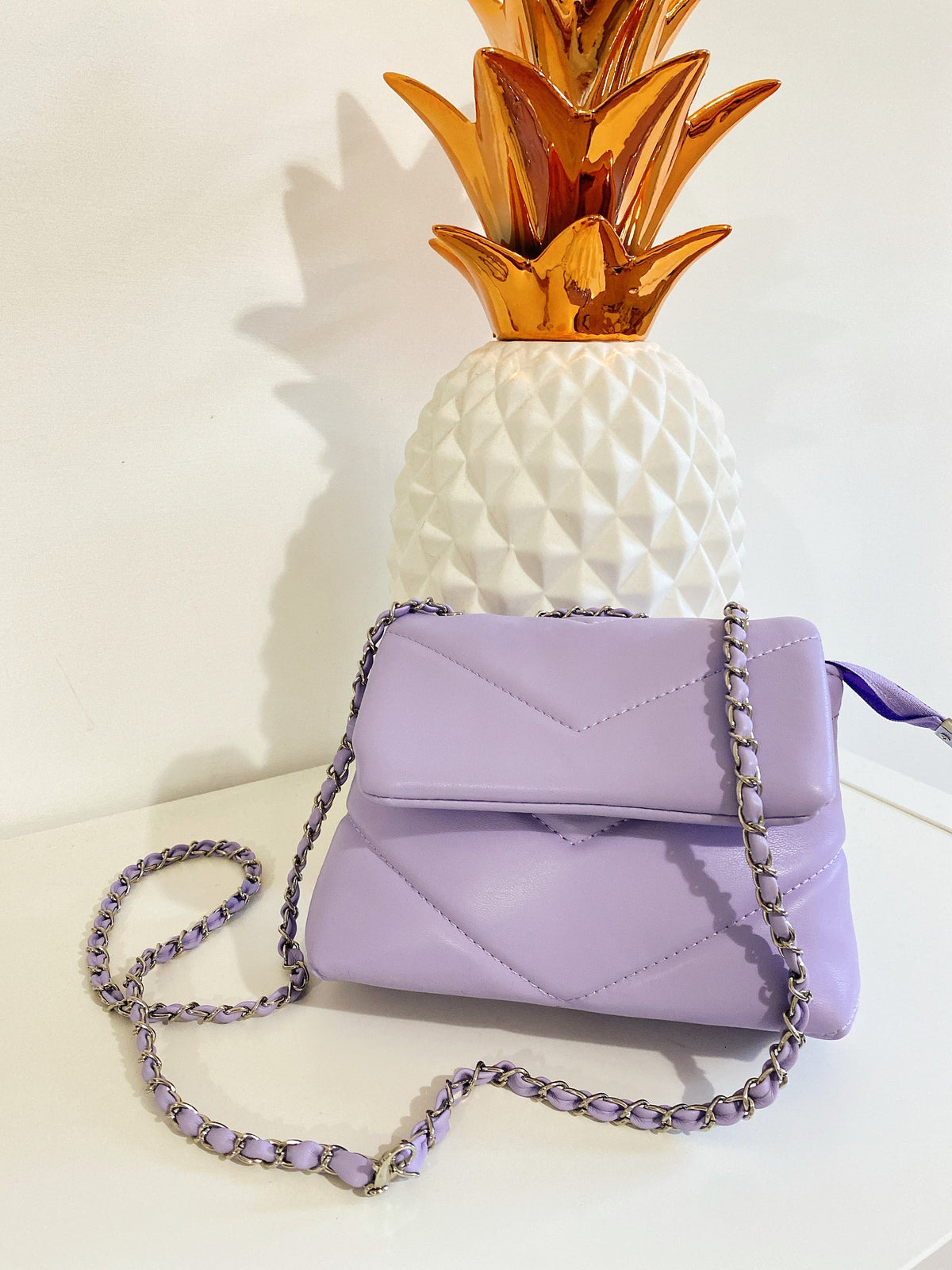 Pochette a mano con catena
