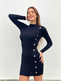 Abito nero con bottoncini oro