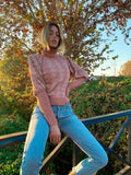 Maglione collo alto rosa e oro