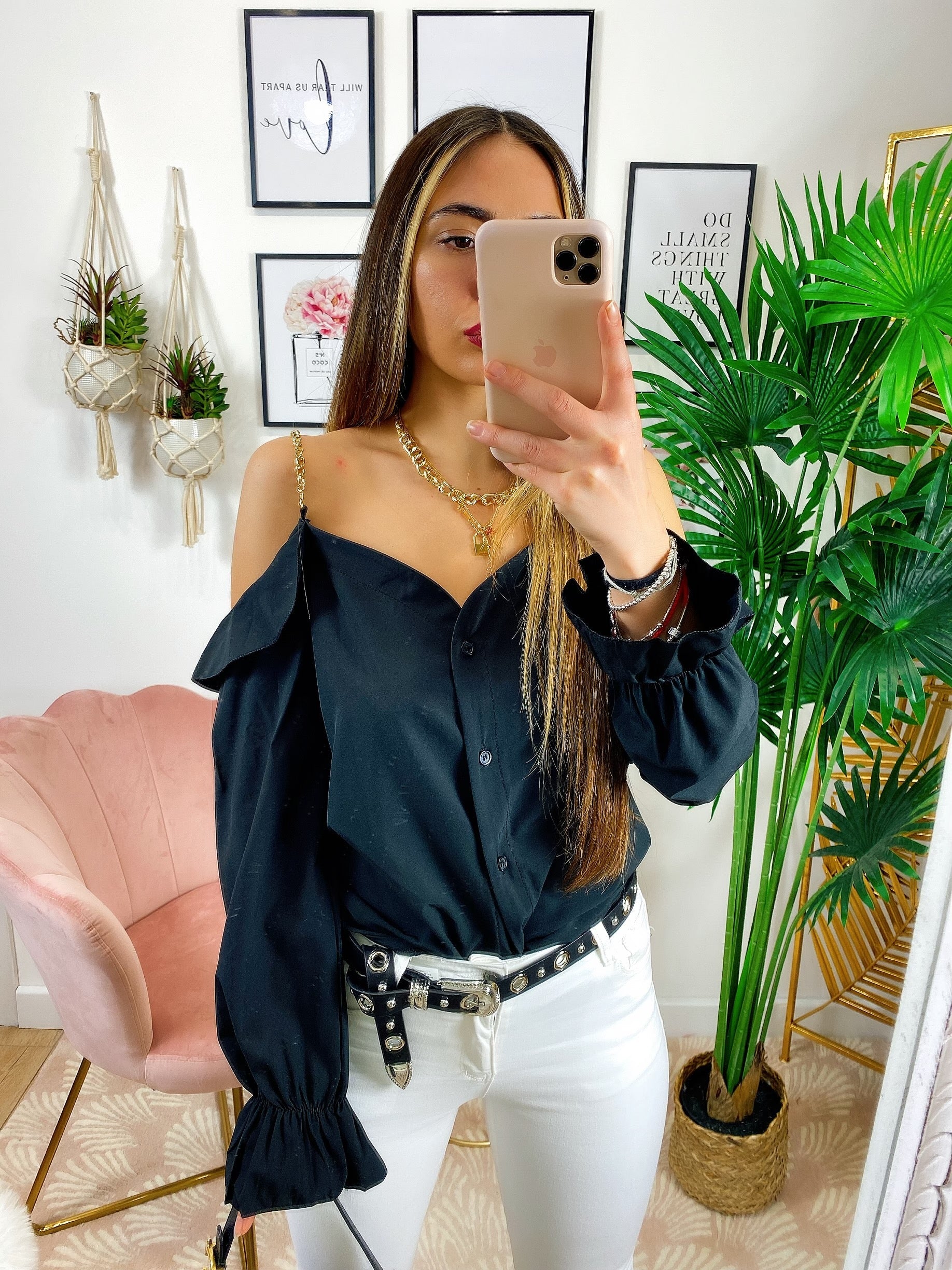 Blusa con catene scollo a barchetta