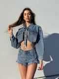 Short jeans con borchie