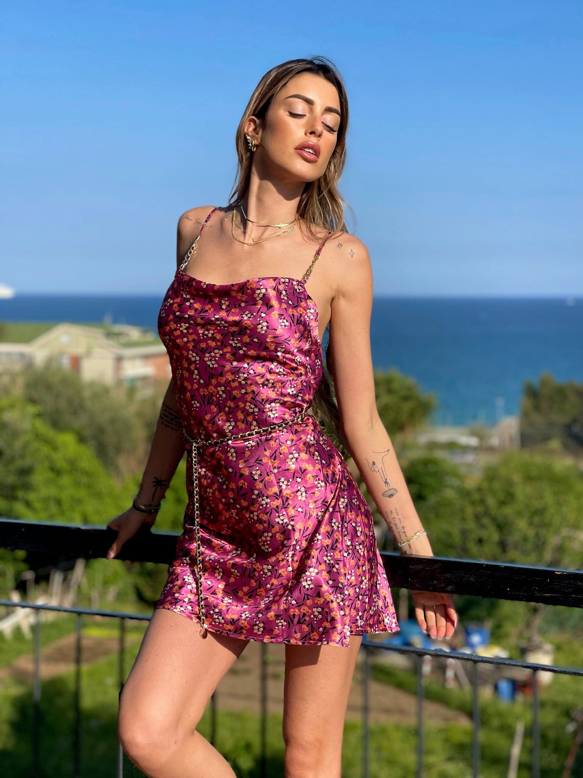 Abito a fiori fuxia