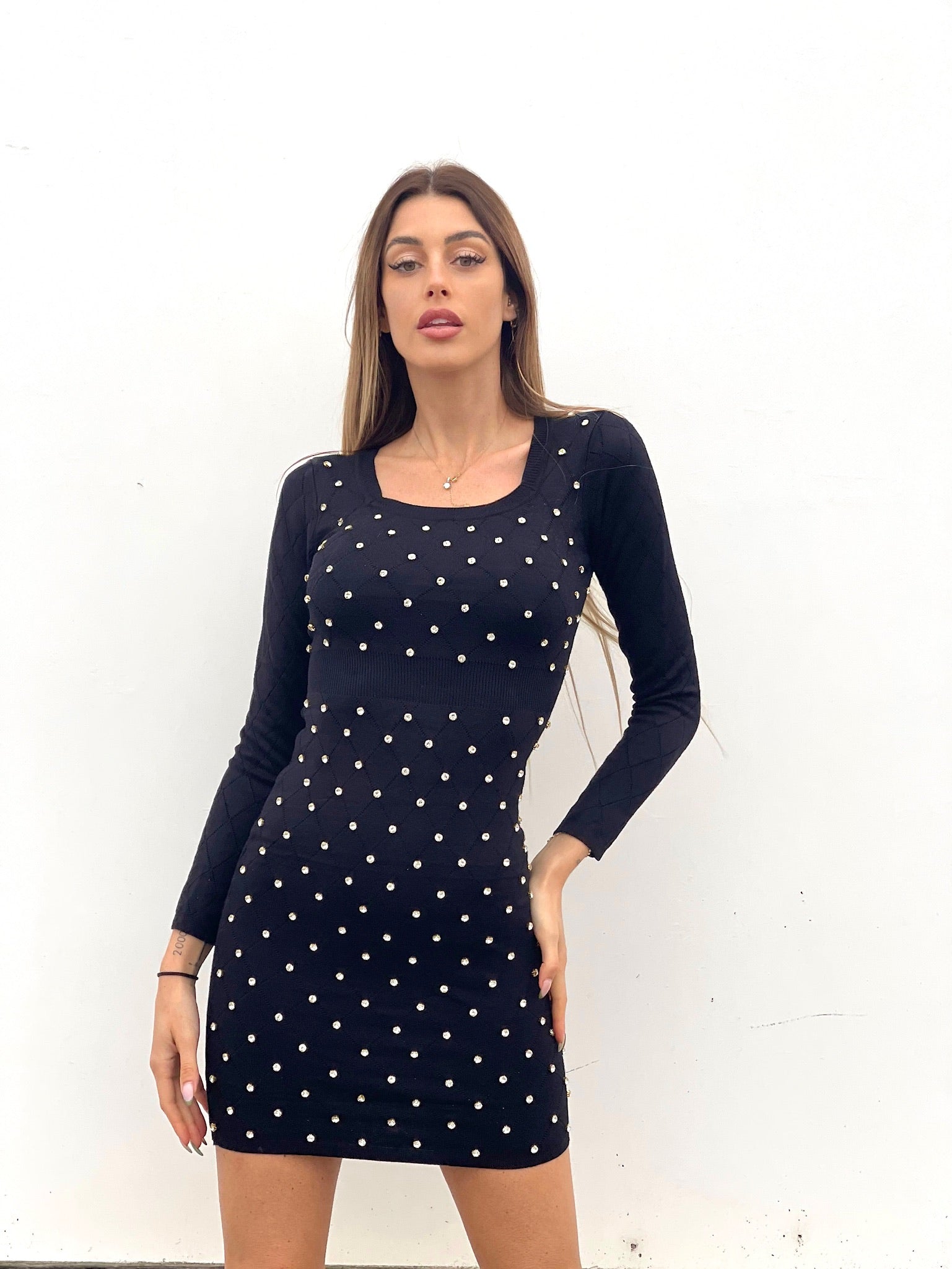 Abito in maglia con strass nero