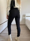 Pantalone aderente nero con cintura