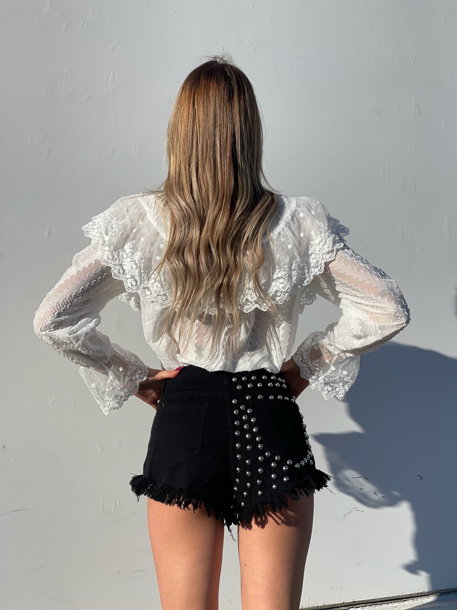 Short nero con borchie