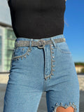 Jeans con strass e cuore