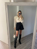 Gonna pantalone nero con catena