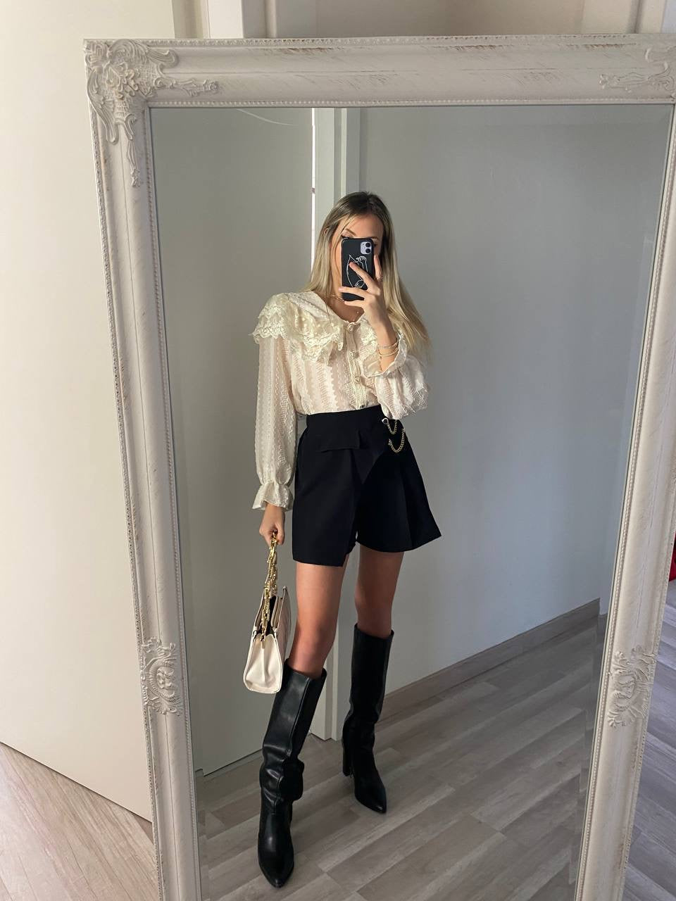 Gonna pantalone nero con catena
