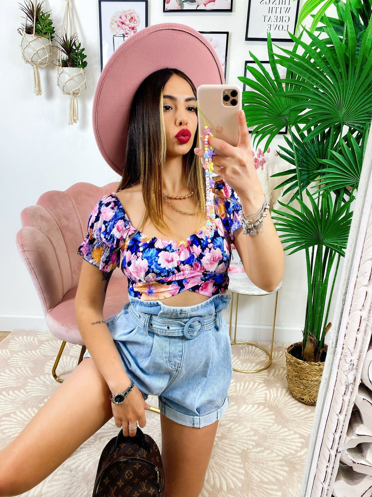 Top floreale con cintura