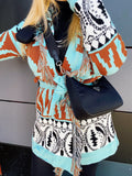 Cardigan Verdeacqua con frange e cinta