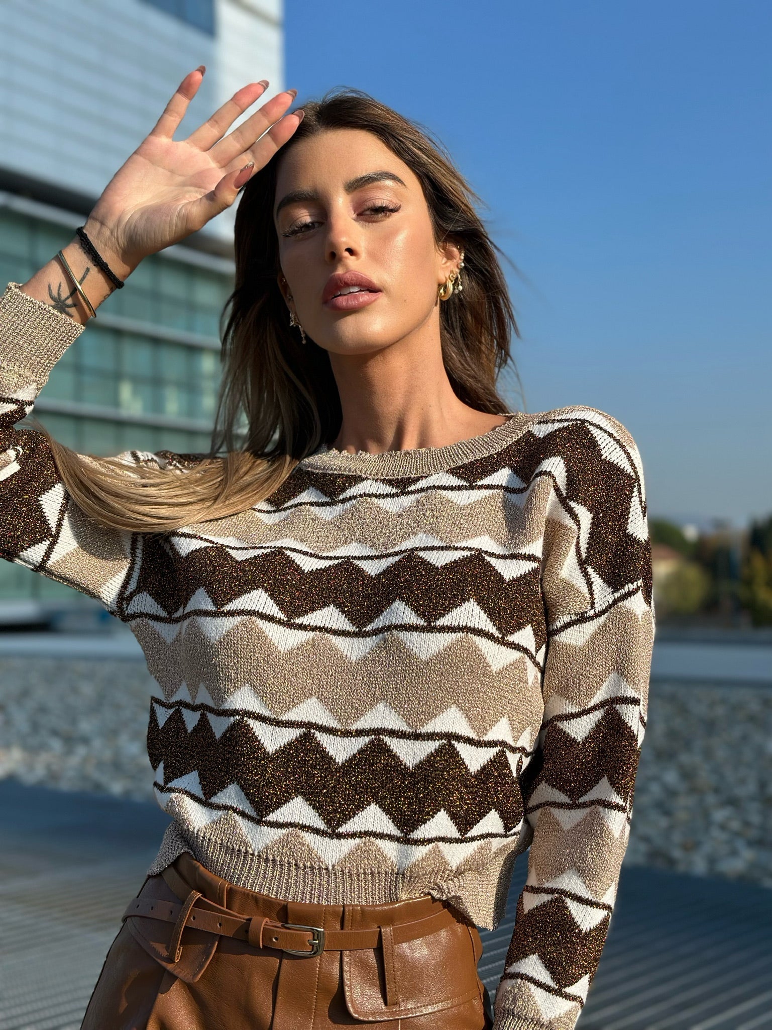 Maglione con rombi nude