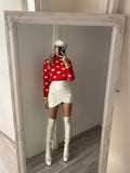 Maglione rosso con cuori