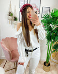 Blusa con catene scollo a barchetta