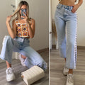 Jeans con aperture laterali