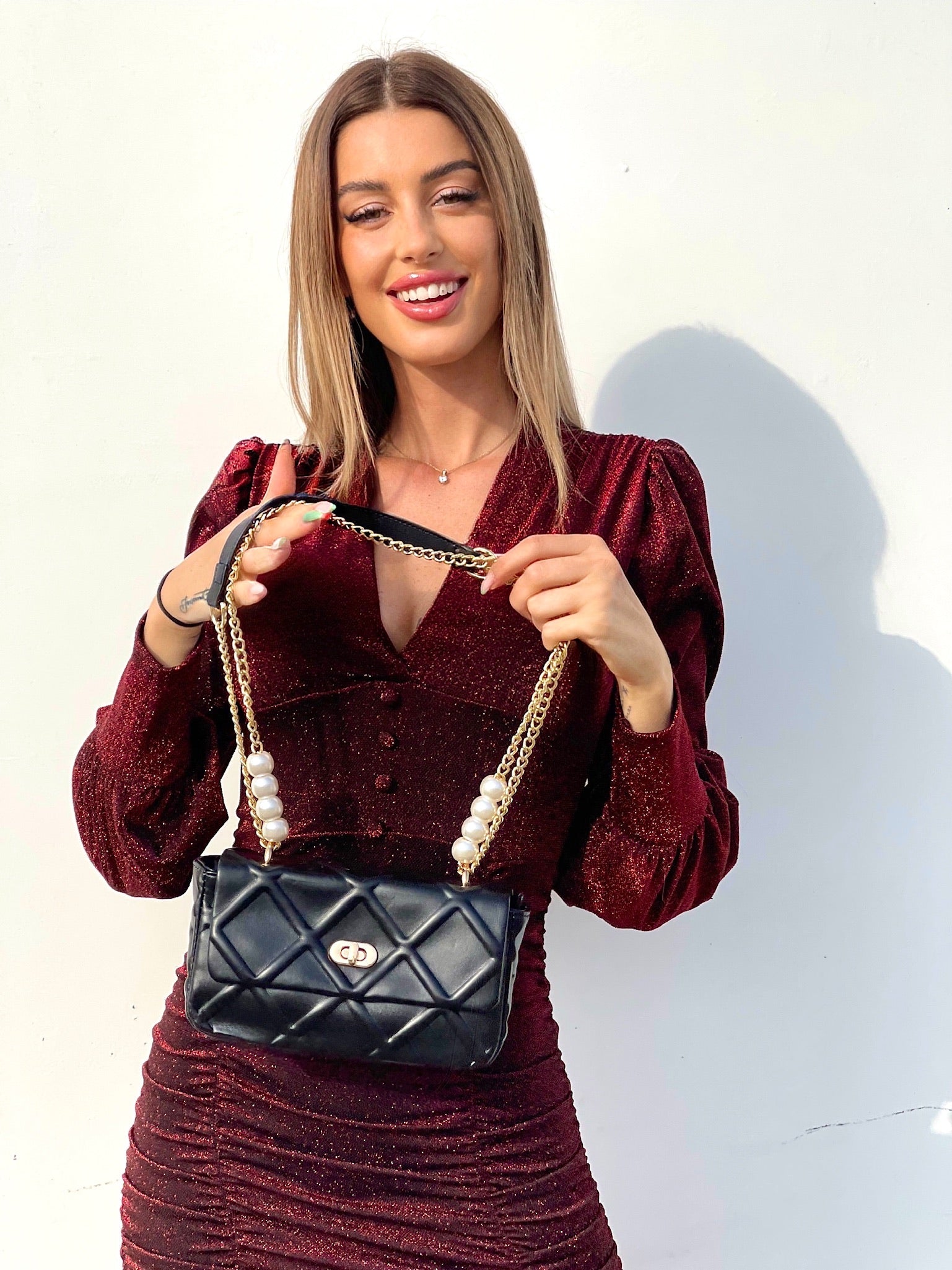 Borsa nera con perle