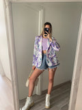Short a farfalla con strass