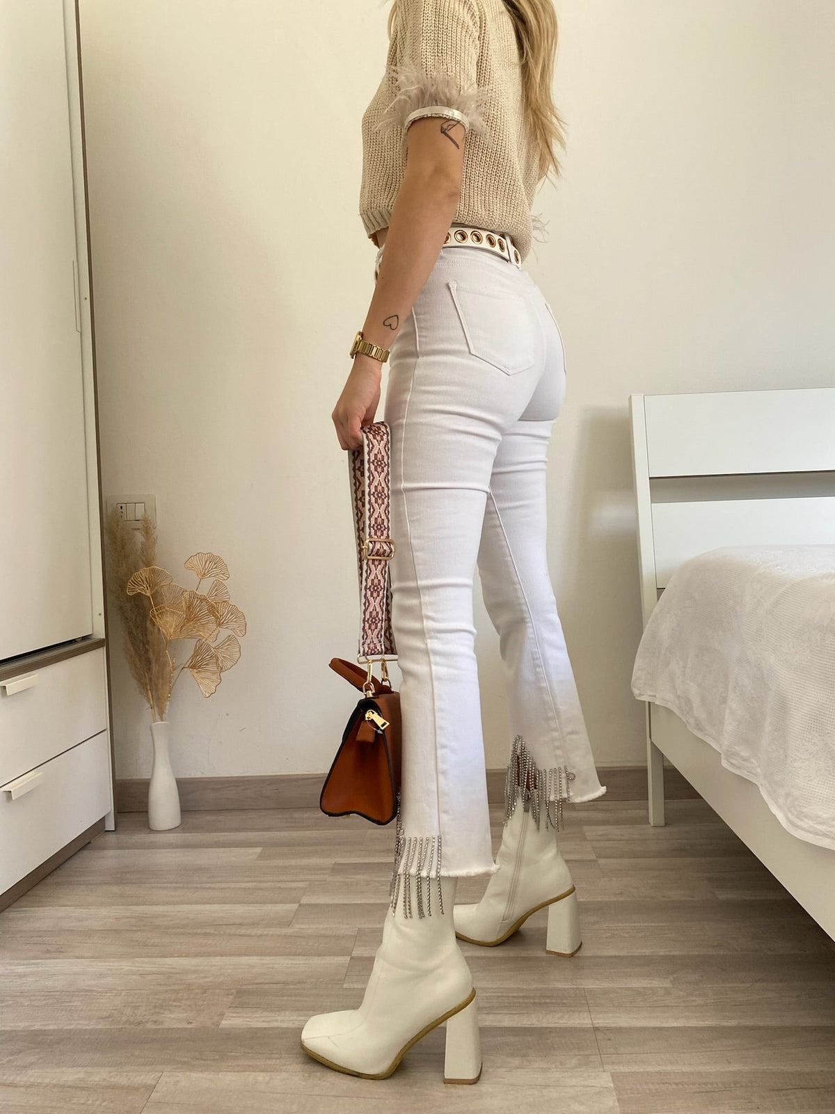 Jeans bianco con frange argento