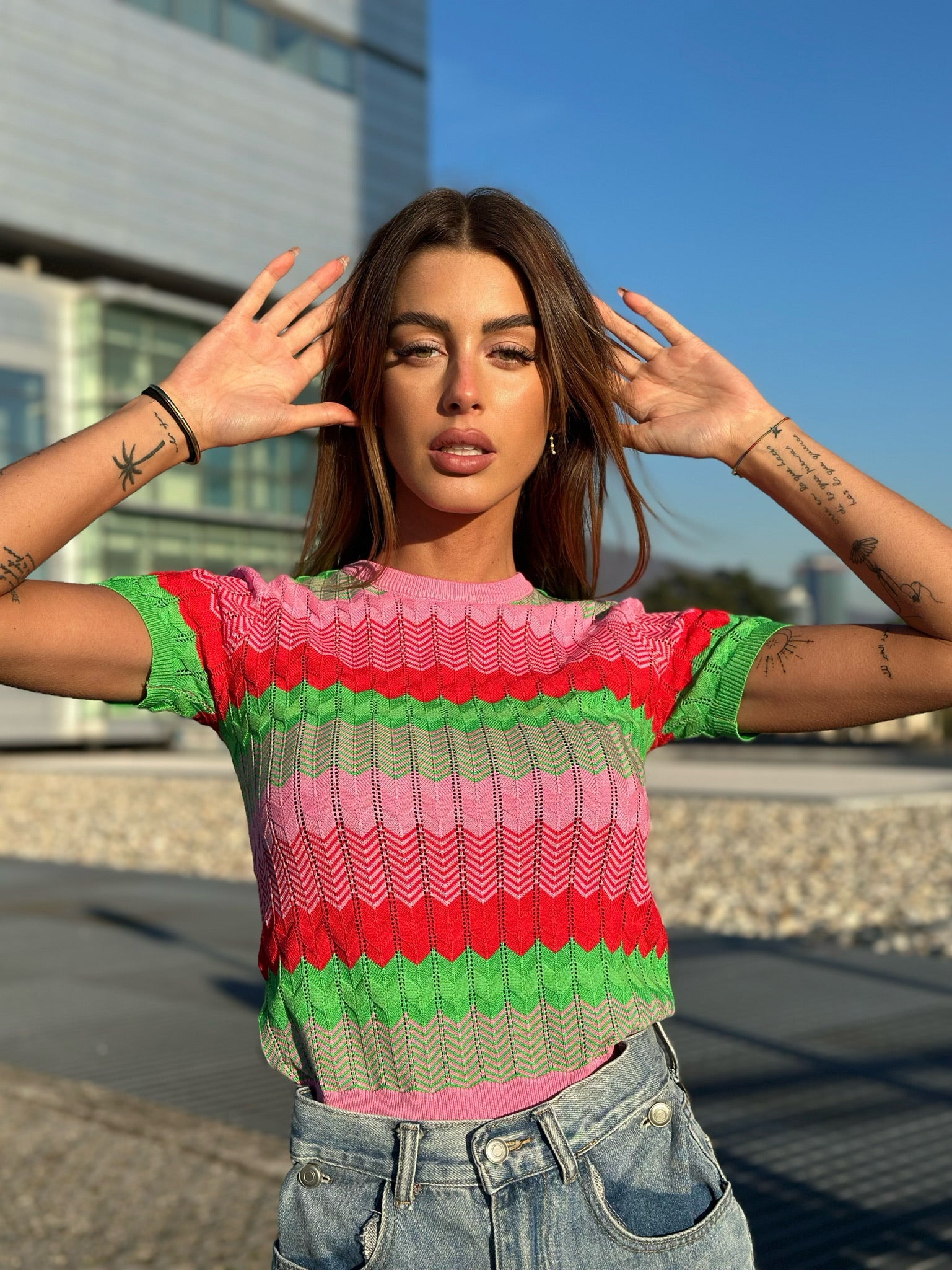 Maglia rosa e verde con cuori