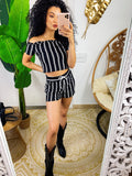 Completo sportivo maglia e pantaloncino nero a righe