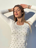 Abito in maglia con strass bianco