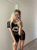 T-shirt kiss animalier nera