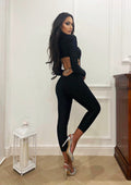 Tuta nera seduction con gioiello