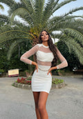 Tubino bianco con trasparenze e strass