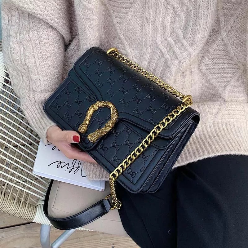 Pochette eco-pelle con ferro di cavallo