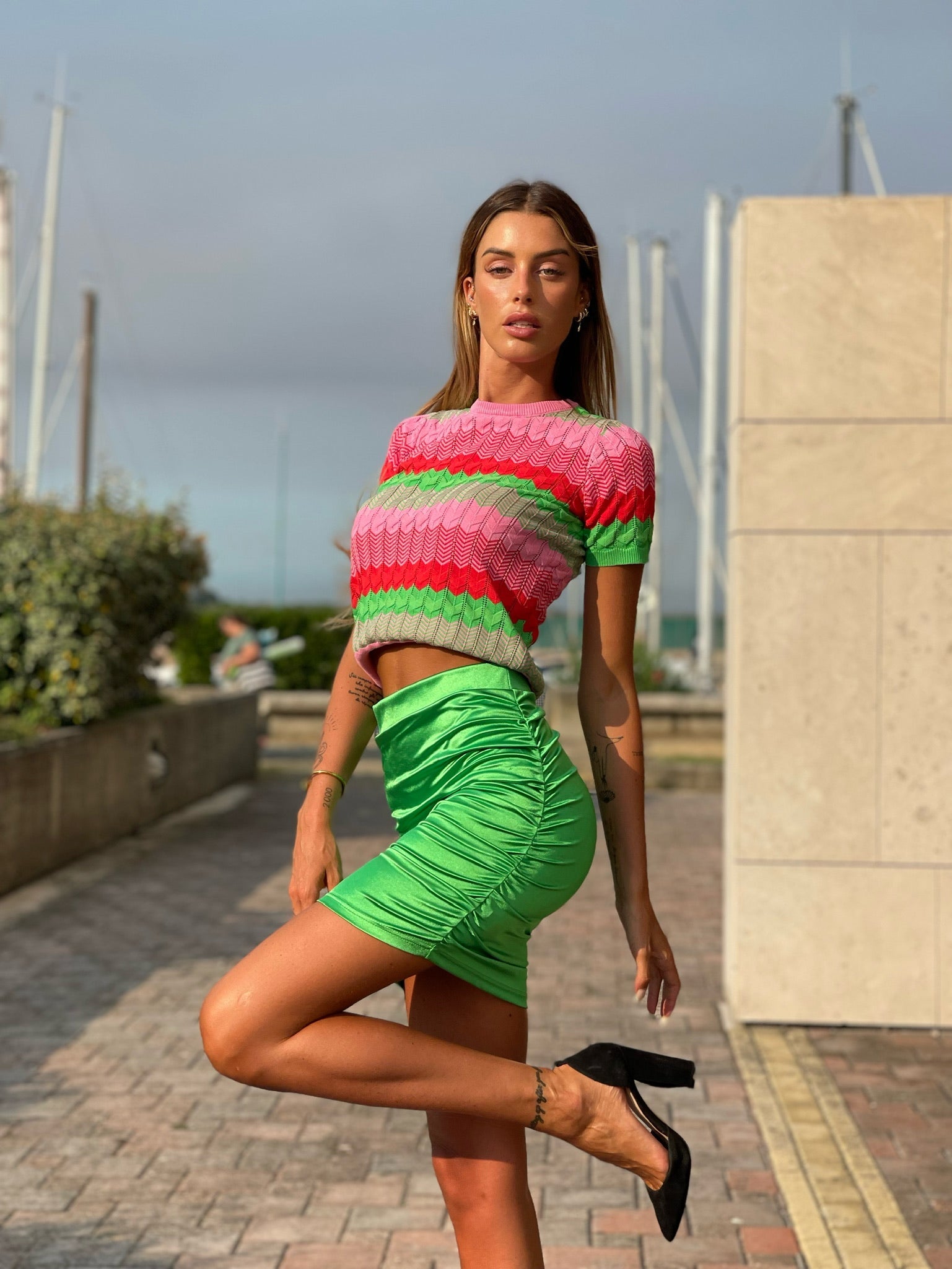 Gonna aderente verde con punto luce