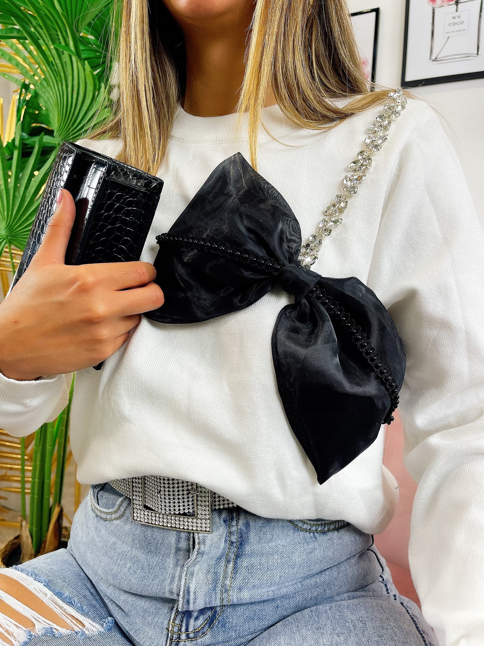 Maglione con fiocco e strass