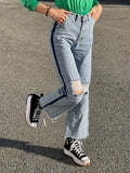 Jeans wide leg con strappi e dettaglio