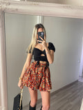 Top Nero con incroci