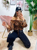 Blusa scollo a barchetta maculata