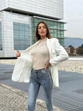 Jeans aderente sfrangiato sotto