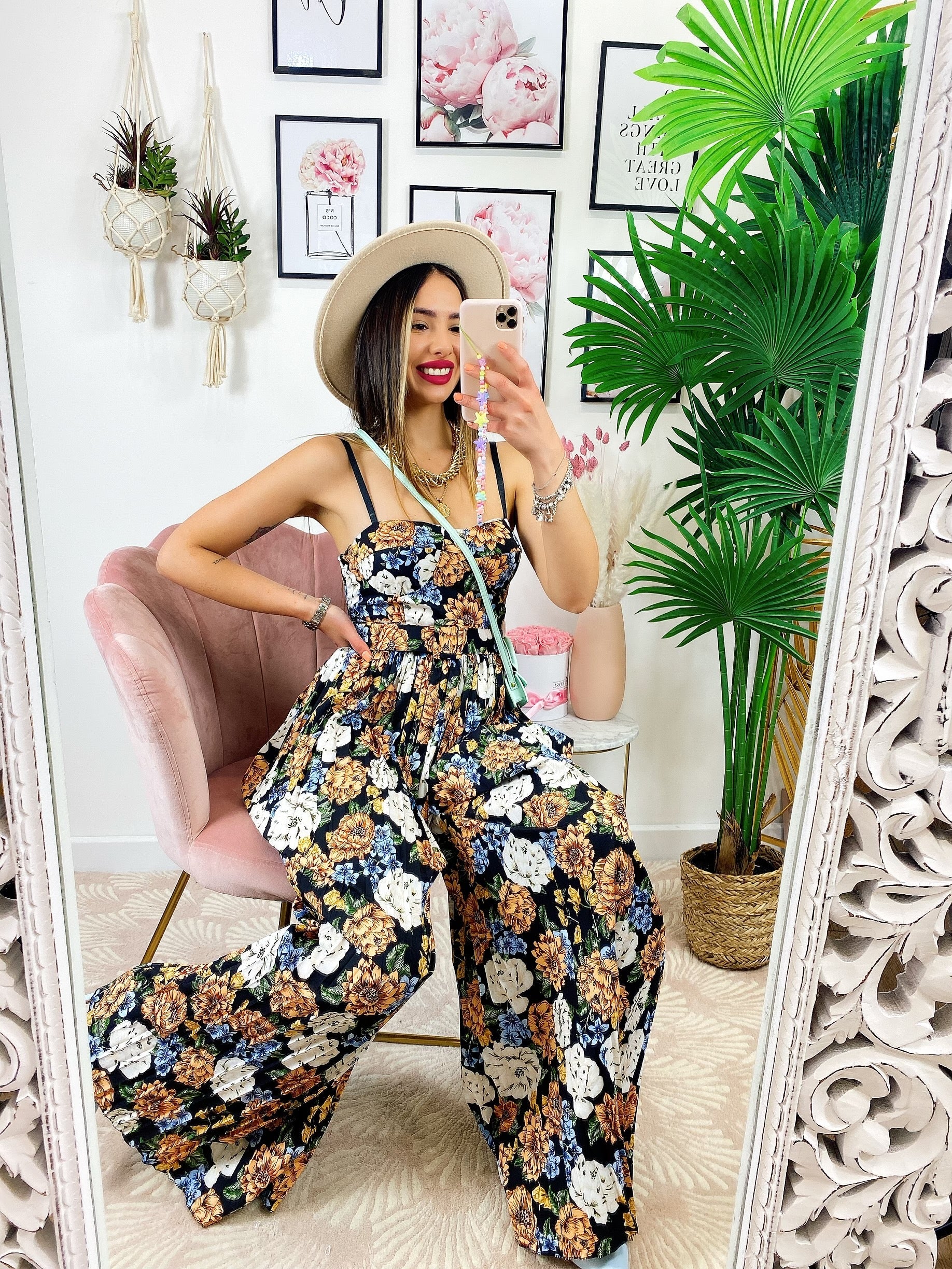 Tuta floreale con pantalone a pieghine