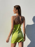 Abito in raso lime con dettaglio luce