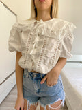 Camicia bianca con pizzo