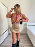 Short in ecopelle con cintura nude