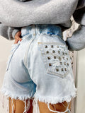 Short Levi’s Vintage bagno chiaro con borchie