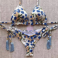 Bikini a triangolo con corda a fiorellini