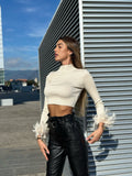 Pantalone in ecopelle con cintura