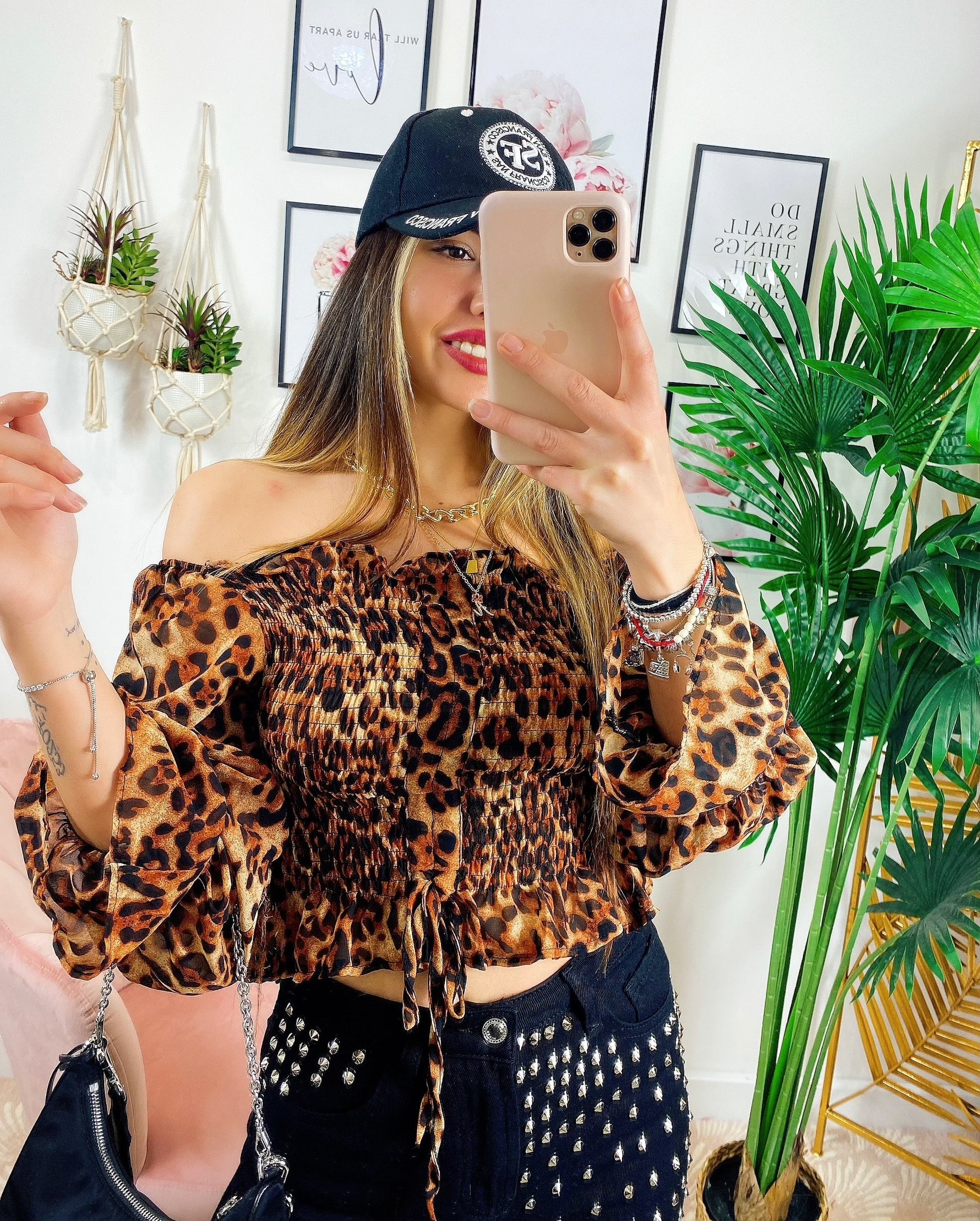 Blusa scollo a barchetta maculata