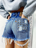 Short Levi’s Vintage bagno medio con borchie