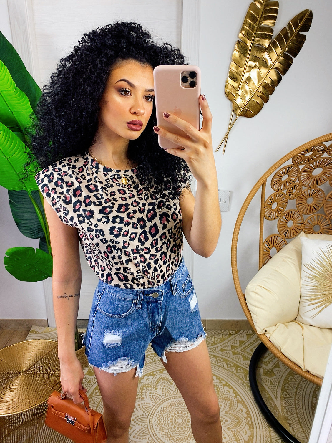 Maglia con spalline bombate a fantasia maculata